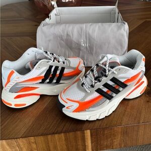 Pharrell Williams x Adidas Virginia Adistar Jellyfish shoes in the Orange Spark